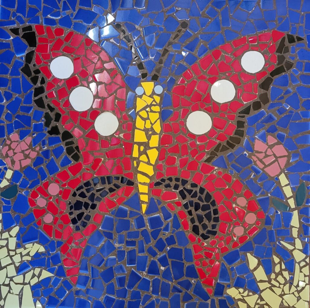 butterfly made out of broken tiles