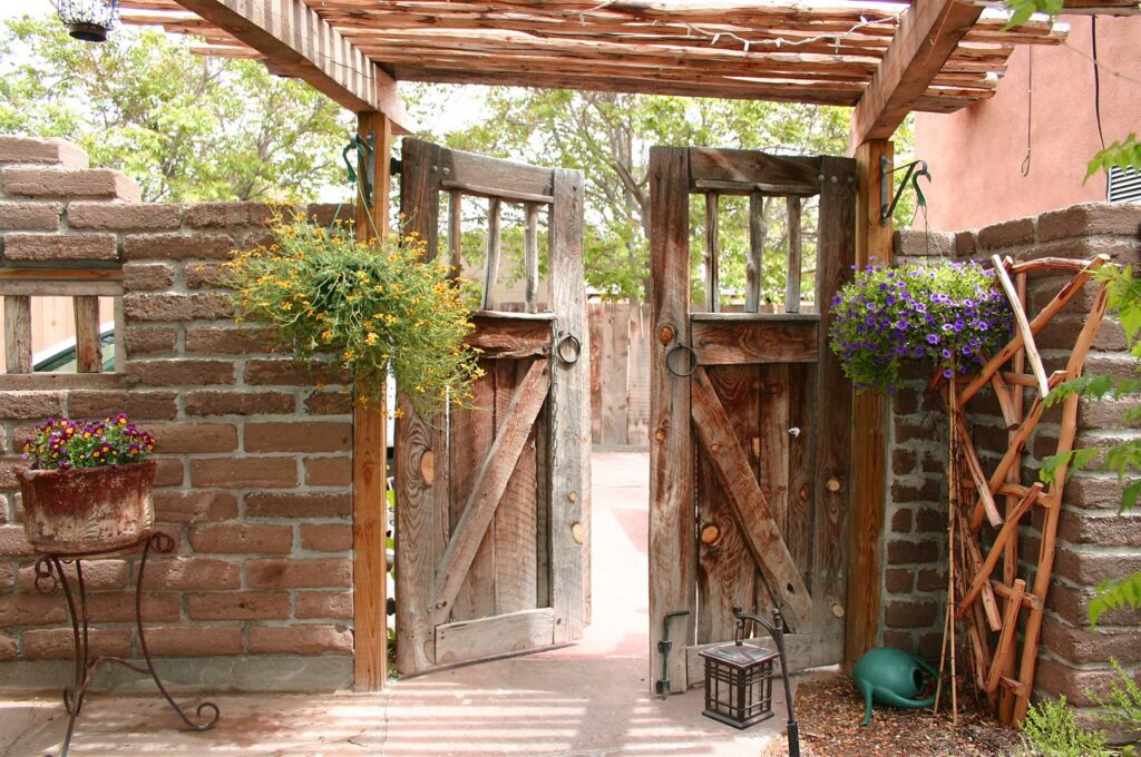 wooden gate with a bunch of flowers